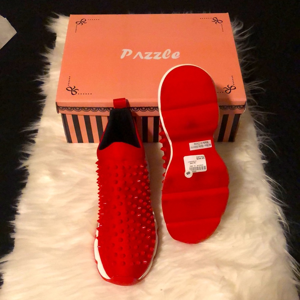 Red spiked Pazzle sneakers